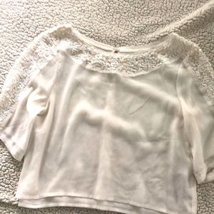 White top- sequin neck border